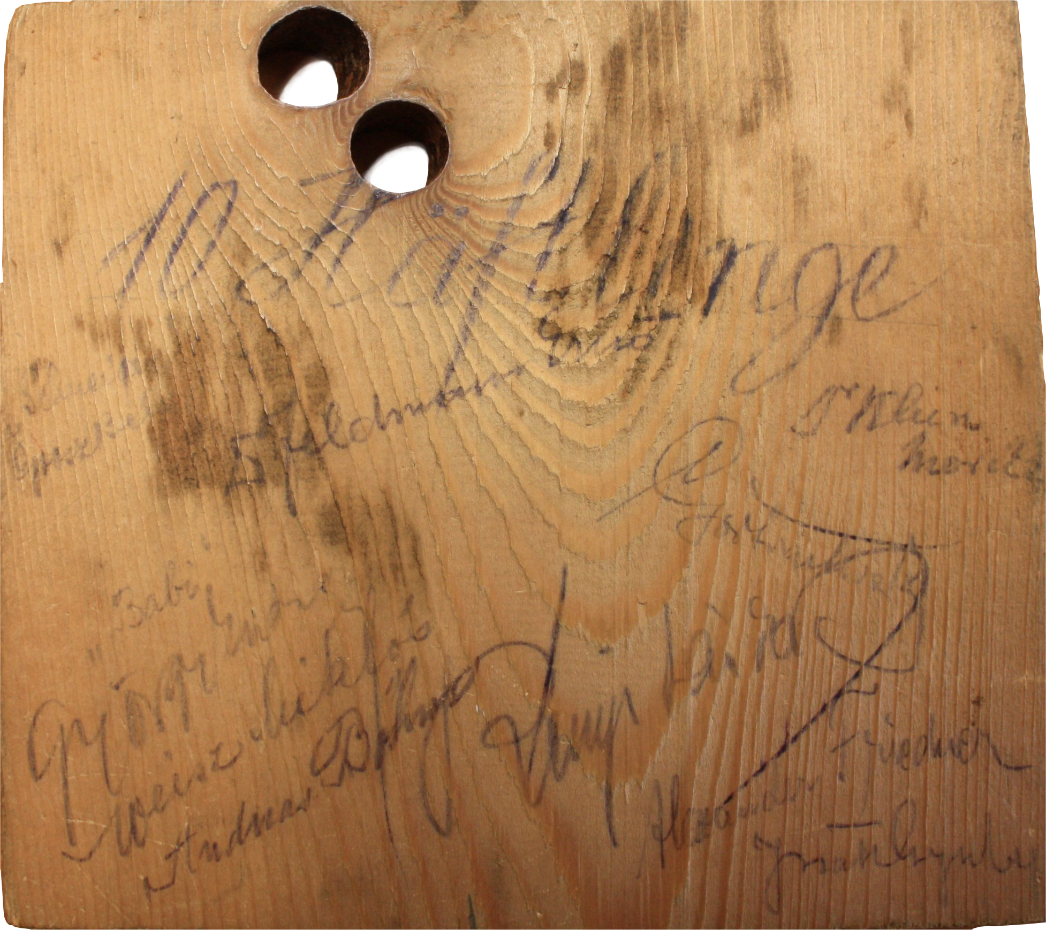 Weihnachtsgruß auf einer Holzplatte an den deutschen Arbeiter Albin Kläffling, 1944, Rückseite.