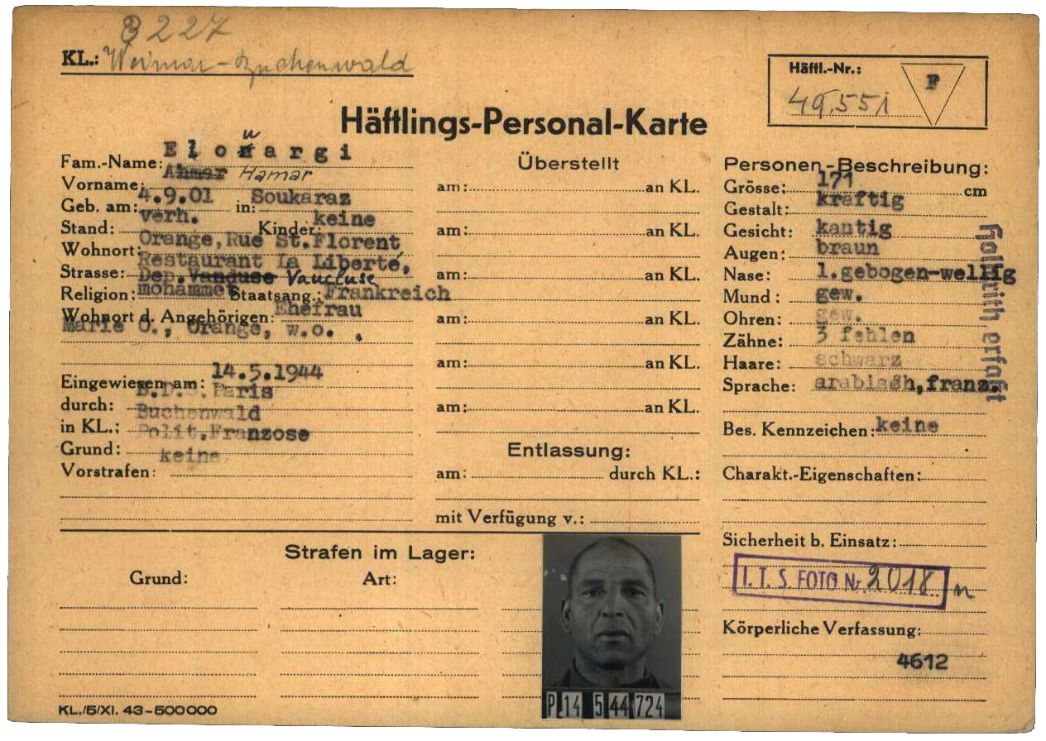 Häftlingspersonalkarte des KZ Buchenwald für Ammar El-Ouarghi (hier fälschlich Hamar Elouargi), 1944. Der in Algerien geborene Restaurantbesitzer wurde wegen Unterstützung der Résistance im französischen Orange verhaftet und im Mai 1944 nach Buchenwald deportiert. Kurz darauf kam er in die Außenlager der SS-Baubrigade III, u.a. nach Nüxei. Er überlebte und wurde im April 1945 in Bergen-Belsen befreit.