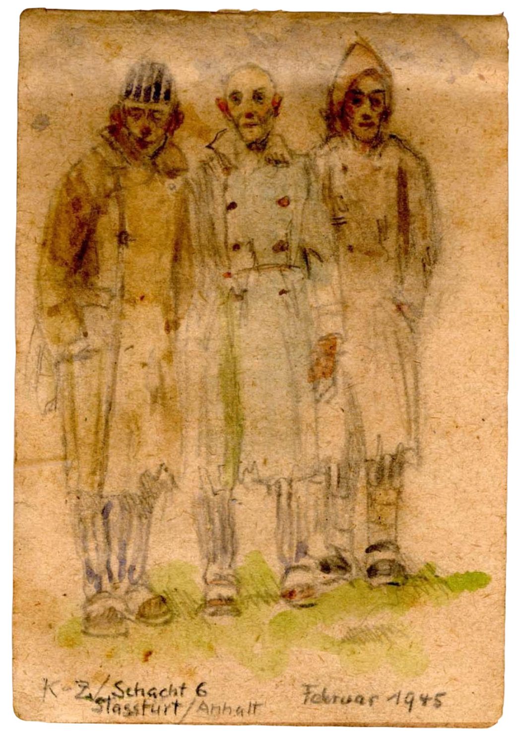 „K-Z/Schacht 6 Stassfurt/Anhalt“. Bleistift- und Aquarellzeichnung von Hellmut Bachrach-Barée, Februar 1945. Bachrach-Barée musste als „jüdischer Mischling ersten Grades“ Zwangsarbeit in einem Arbeitslager der Organisation Todt in Staßfurt leisten. Dort fertigte er die Zeichnung an, die drei namentlich nicht bekannte KZ-Häftlinge des Außenlagers Staßfurt zeigt.